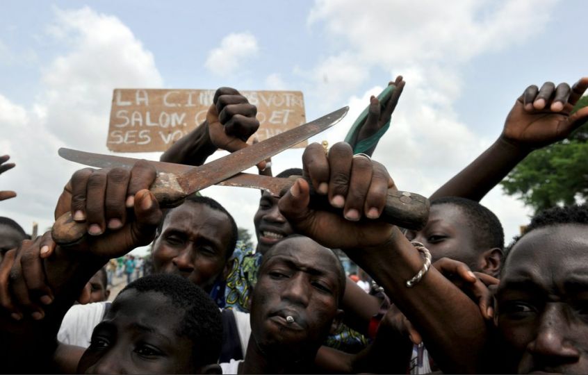 Ivory Coast, Part 1. ”The country erupted into turmoil this week as protests against the rule of President Laurent Gbagbo met resistance from his security forces. These demonstrators gathered in a section of Abidjan where six women had been killed.” Photo by Issouf, Sanogo/AFP/Getty Images, ”Lens,” New York Times