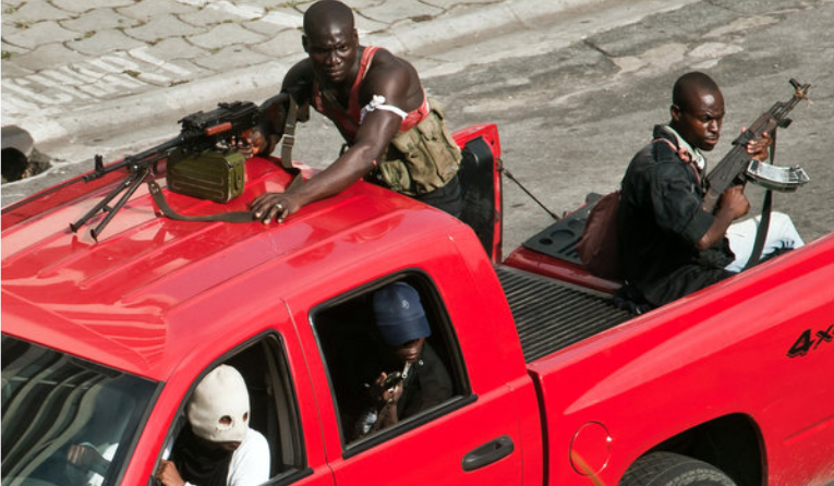 Ivory Coast, Part 1. u201dIvory Coast's embattled Laurent Gbagbo seems to be out his way outu2014hiding in a bunker, at last report. In this photo, fighters loyal to Gbagbo patrol Abidjan.u201d Photo by Philippe Lsiazek/AFP, Newsweek, April 11