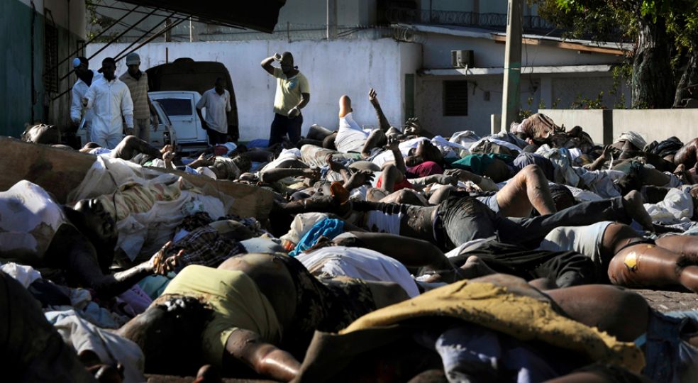 'Sea of Sadness' Bodies were piled on street corners and at the city morgue, and residents stepped past quickly, holding limes to their noses to block the stench. Family members were moving their dead across the city in coffins borne on shoulders. One man ferried a body down a street in a wheelbarrow. A crew of men with shirts wrapped around their faces lurched down the block in a converted school bus stacked with corpses. (Carol Guzy, The Washington Post - January 15, 2010)