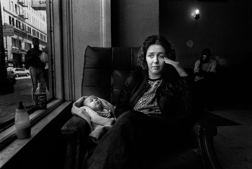 Julie with Rachael, 3 months, in the lobby of the Ambassador Hotel where they live in San Francisco. Both Jack and her partner Julie are HIV positive. Julie said, 