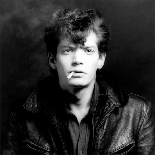 Robert MapplethorpernSelf Portrait u00a01980 rnGelatin silver print, 20 x 16 inches (paper)rn©Robert Mapplethorpe Foundation, Used by permission, Courtesy of Sean Kelly Gallery, New York