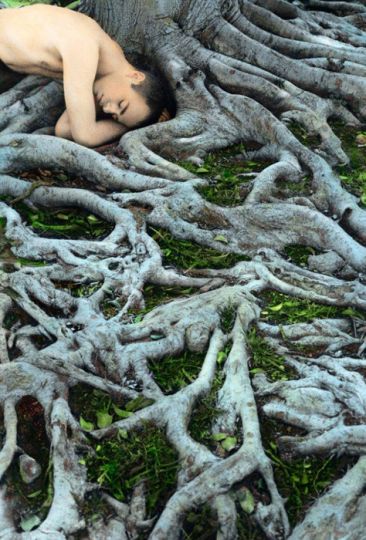 Youssef NabilrnSelf Portrait with Roots, Los Angeles, 2008rnHand colored gelatin silver print, 10.5 x 15.5 in / 27 x 39 cm, Edition 6 of 10rnCourtesy of the artist and Yossi Milo Gallery