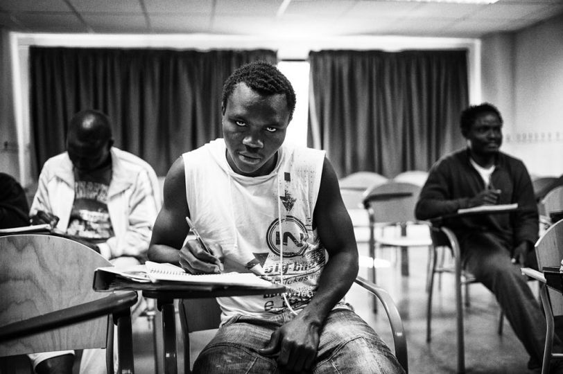 Spain, Ceuta, April 10 2012. A group of students during the Spanish language class provided by the CETI Administration. © Gianfranco Tripodo