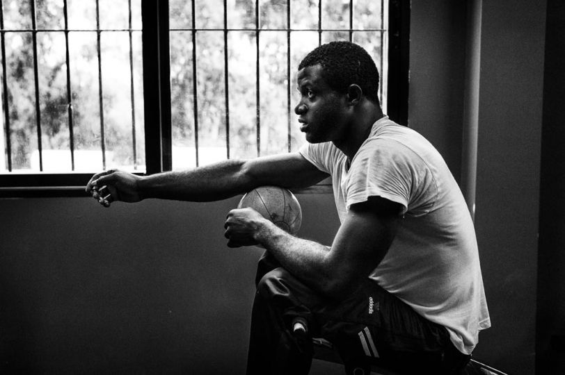 Spain, Ceuta, April 10 2012. A guest of CETI is training inside the little gym of the centre. © Gianfranco Tripodo