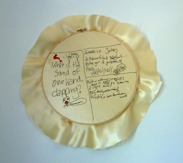 u201cSurrealist Jokesu201d, 2012rnEmbroidery thread, satin and sewing hoop. © Frances Goodman