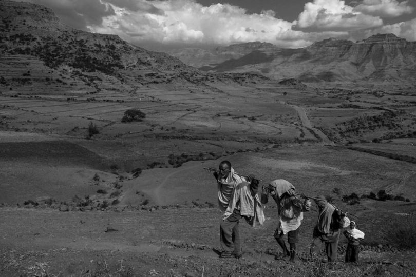 Devoted rural people hiking for days and even weeks to get to Lalibela for the Christmas ceremonies that last for 3 days and 3 nights.
Every year, just before Christmas day (Julian calendar) thousands of pious Christian orthodox worshippers make pilgrimage to Lalibela, a small town in Ethiopia’s highlands, known as Jerusalem of Africa or Black Jerusalem. Lalibela is famous for its 13th century monolithic churches, carved out of the living rock and one of the world's great wonders. © Gali Tibbon