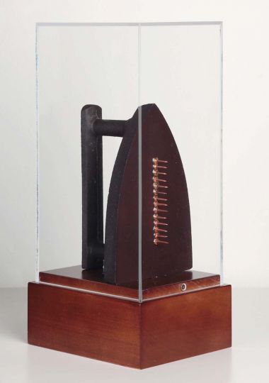 Man Ray (1890-1976) --Cadeau--, 1921-1974 bronze with brown patina and metal tacks © Man Ray Trust Paris/VG Bild-Kunst, Bonh 2013, Courtesy Kicken Berlin