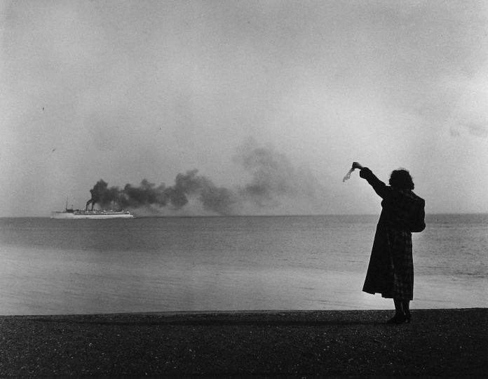 After all, he did promise to return, did he not?, 1927 Gelatin silver print; printed later 11 x 14 inches Signed and titled in ink on print recto. Numeric annotations in pencil on print verso. © Chim (David Seymour)/Magnum Photos