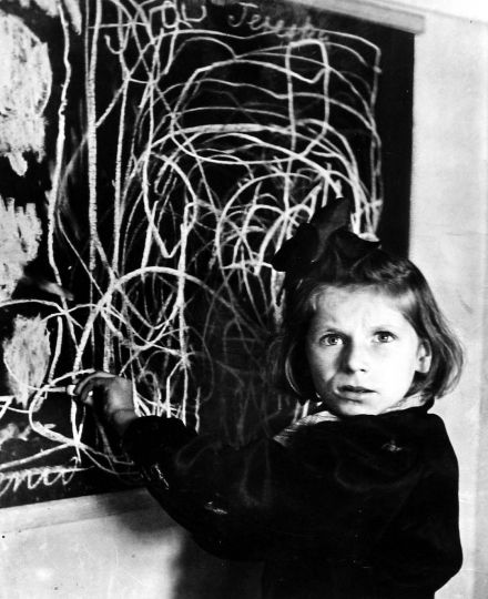 Tereska is cared for at a Polish center for disturbed children, Poland, c.1948 Gelatin silver print; printed later 7 3/4 X 9 3/8 inches Titled in pencil with Magnum stamp on print verso. © Chim (David Seymour)/Magnum Photos