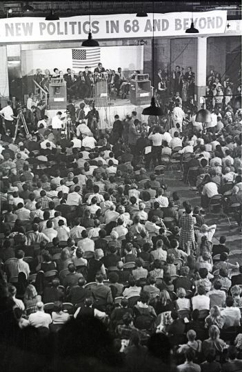 Dr. King addresses the New Politics Convention at the Chicago Coliseum. He spoke about the direction of the war in Vietnam, the beginnings of a better quality of life for all people, and the concept for u201cResurrection City.u201d Chicago, Illinois, October 1967. © Benedict J. Fernandez