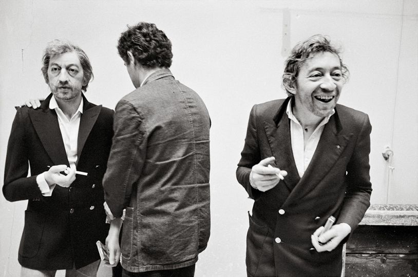 May 2, 1981: French Singer Serge Gainsbourg with His Wax Statue, at the Musée Grévin. © Guy Le Querrec/Magnum Photos.