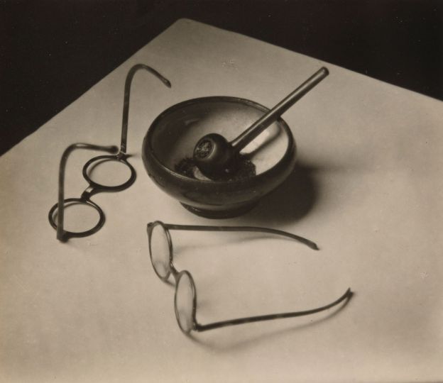 André Kertész (American, born Hungary. 1894-1985). Mondrian's Glasses and Pipe. 1926. Gelatin silver print. 3 1/8 x 3 11/16u2033 (7.9 x 9.3 cm). The Museum of Modern Art, New York, Thomas Walther Collection. Grace M. Mayer Fund © 2014 Estate of André Kertész