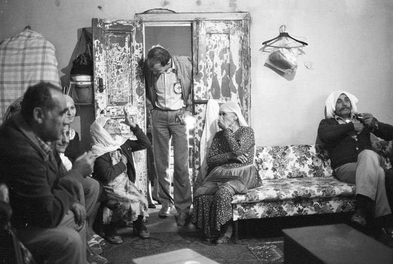 © Hassan Al-Zein, Lebanese journalist and editor at As-Safir newspaper, 1983.rnu201cThe morning of November 4th 1983. A mother and her ten children are getting ready to go to school. Suddenly, the sound of an explosion.  They are all shaken. News of the explosion then spread fast. A member of the resistance drove his rigged car into the headquarters of the commander of the Israeli army near Al Shajara School and blew it up, it is where the father and his friends are being detained. The scene would have been much more dramatic, had it not been for an angel who had visited the house the day before. His name was Ryad Dbouk, a staff member of the International Committee of the Red Cross. He had visited their father and came to inform them that he was transferred from the Al Shajara School to the Seraille in Saida, while his companions were transferred to the Ansar detention center. The children had all reasons to be relieved. An angel had re-written the script and altered what would have otherwise been a tragic scene.u201drn