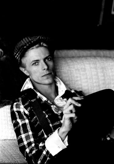 Photographs by Steve Schapiro, from Bowie, published by powerHouse Books. David relaxed at his house in Los Angeles, 1975. I particularly liked his hands in this photo.