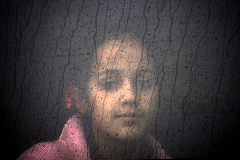 As the sun rises a dinghy overcrowded with Syrian refugees drifts in the Aegean sea between Turkey and Greece after its motor broke down while traveling from the Turkish coast to the Greek island of Kos, August 11, 2015. A Greek coast guard responded to distress signals and arrived at the scene to help. REUTERS/Yannis Behrakis