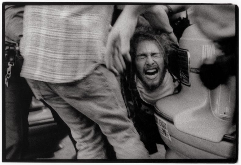 © Sylvia Plachy, A demonstrator against the capitol punishment of Mumia Abu Jamal.