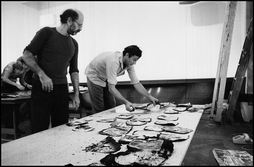 Beard assembles remnants from a fire that destroyed his Montauk, NY windmill © Orin Langelle