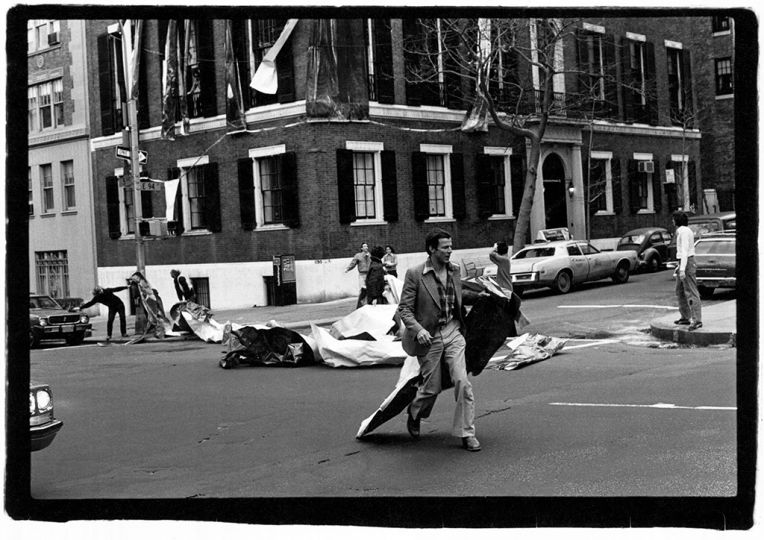Beard on 5th Avenue and 94th Street retrieves part of 75 foot long photographic mural © Orin Langelle