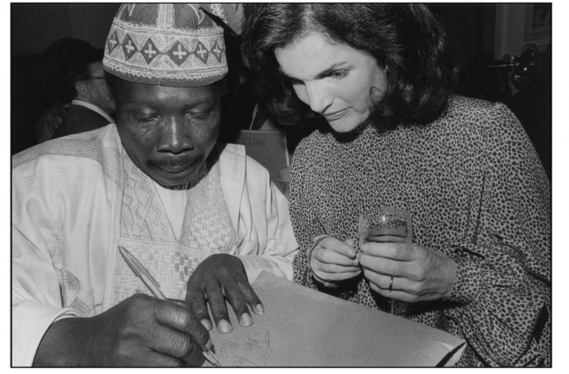 Babatunde Olatunji (left), a Nigerian drummer & Jacqueline Onassis © Orin Langelle