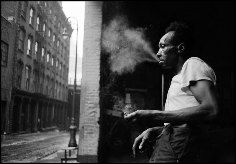 USA. New York City. 1955. Man smoking © Erich Hartmann