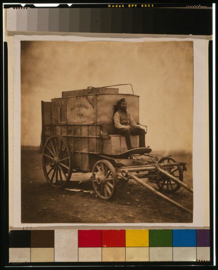 Roger Fenton - Marcus Sparling seated on Fenton's photographic van, Crimea
