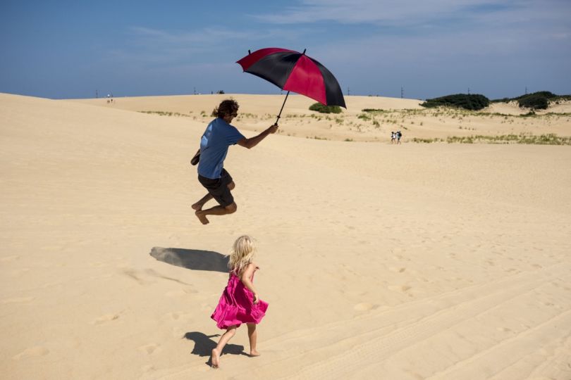 After watching the
solar eclipse (90%
totality) atop Jockey's
Ridge State Park. Outer
Banks, North Carolina,
USA, 2017 © David Alan Harvey /
 Magnum Photos