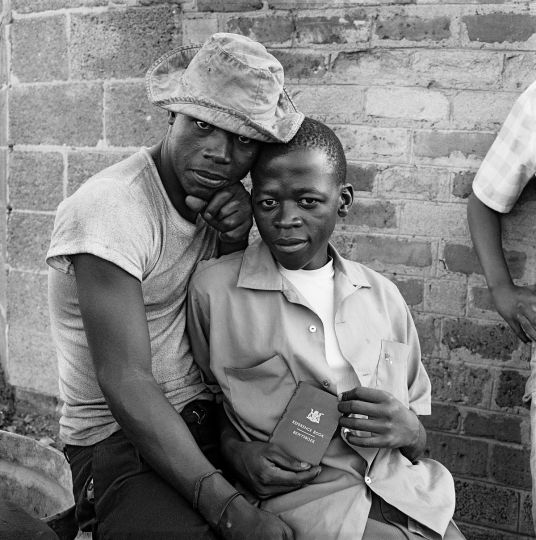 David Goldblatt, Young men with dompas (an identity document that every African had to carry), White City, Jabavu, Soweto, 1972