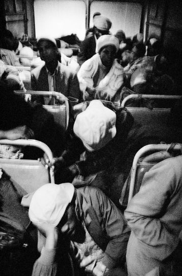 David Goldblatt, Going to work: 3:30am, Wolwekraal-Marabastad bus, standing passengers have slumped to the floor, 1983