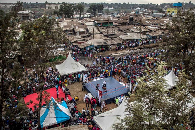 Kibera: Stories From Within © Brian Otieno 1st Place - Boxers fight during an East African boxing tournament hosted by the organisation 