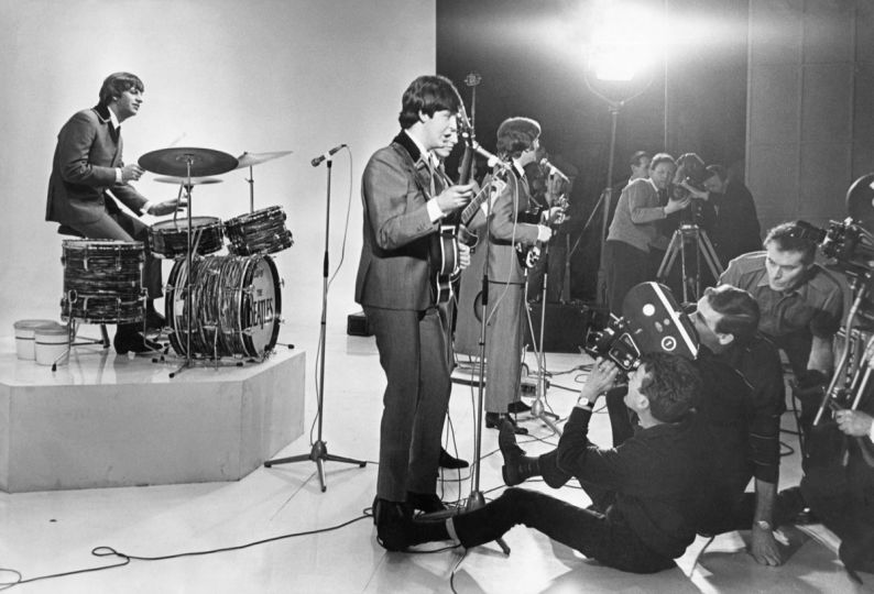 The Beatles - in rehearsal for their Christmas show at the Hammersmith Odeon, 23 December 1964 © Terry O’Neill / Iconic Images