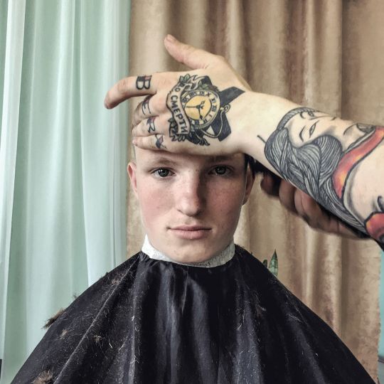 [Time] to death. Haircut of 18-years old teenager, before his release from orphanage. Idritsa, Pskov region. Série #Draft #Russia, 2016 © Dmitry Markov Courtesy Joe Baio Photography Collection