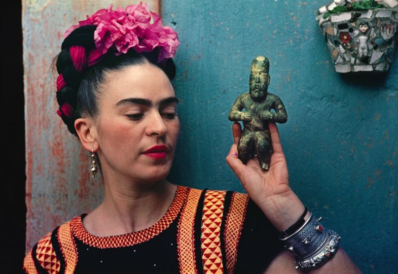 Nickolas Muray (American, 1892–1965). Frida with Olmeca Figurine, 1939. Carbon print, 10 3/4 x 15 3/4 in. Throckmorton Fine Art, New York. © Nickolas Muray Photo Archives