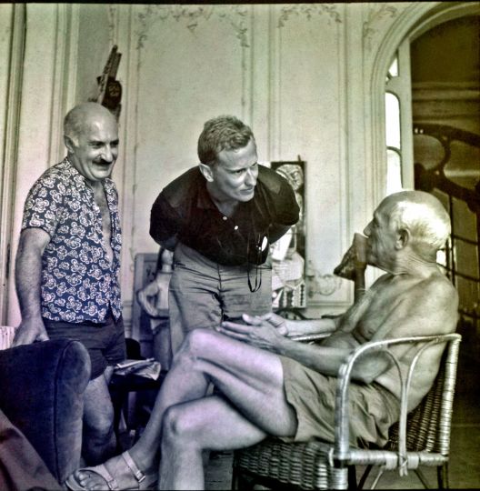 Fred Baldwin (center) with Pablo Picasso, at the painter’s home in Cannes, July 1955.
“In July 1955, I met Pablo Picasso.  I was a college student.  He was my imaginary father. I delivered an illustrated letter to his doorstep in Cannes explaining why I had to see him. I was scared to death, but it worked.  He was amused by my humor and tenacity and opened his door. I spent the day with him. It changed my life. After this experience, I felt that I could do anything I set out to do.  It became my Picasso mantra: ‘You must have a dream, use your imagination, overcome your fear and act.’ This set in motion much of what is described in this book.” 
© Fred Baldwin
