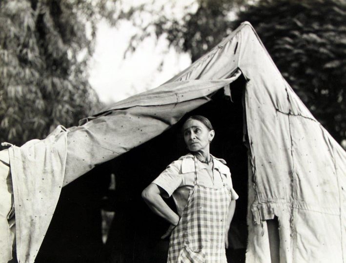 Dorothea Lange, Greek migratory woman living in a cotton camp near Exeter, California., c.1935. Gelatin silver print, printed c.1935, 7 1/8 x 9 1/2 in. - Courtesy Howard Greenberg Gallery