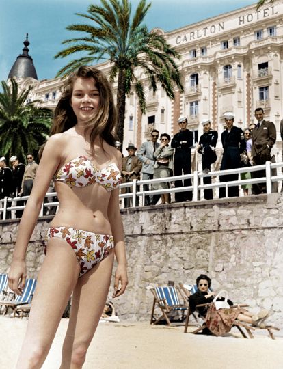 Brigitte Bardot caused a sensation at the 1956 Cannes Film Festival in a tight, flower-patterned bikini, © AURIMAGES © Ghislaine Rayer & Patrice Gaulupeau – Courtesy BikiniARTmuseum