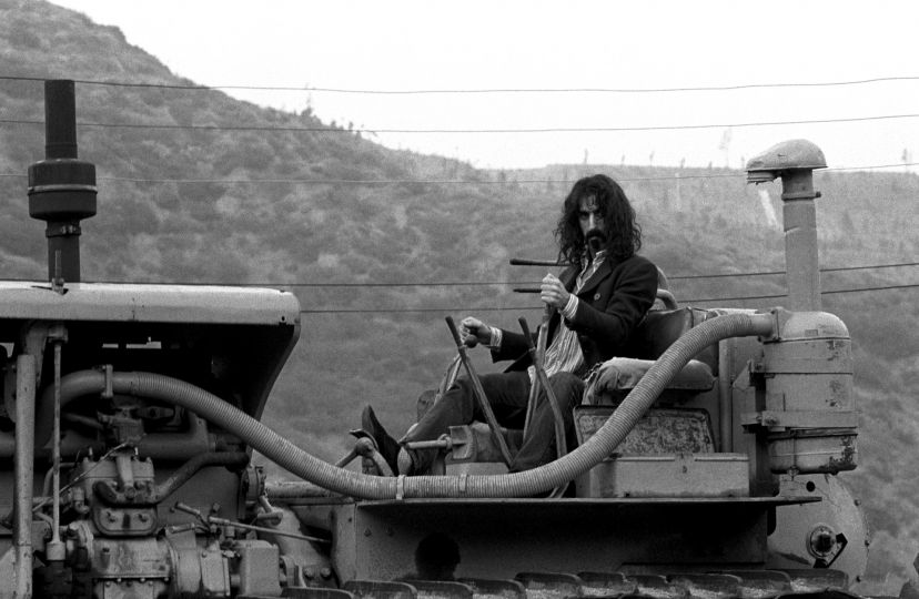 Baron Wolman, Frank Zappa on Tractor, Behind his Laurel Canyon home, Los Angeles, CA, 1968. 