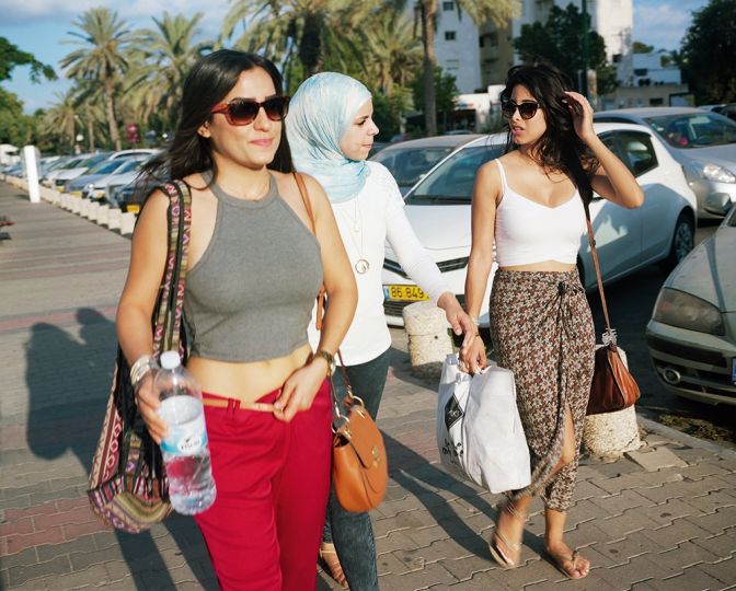 Samar, Aya, and friend, Abba Ahimeir Street, Ramat Aviv. - A Place of Our Own © Iris Hassid / Schilt Publishing