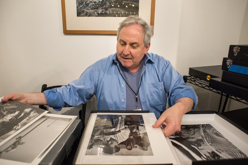 Stephen Cohen admiring some prints, Photo L.A. 2017 © Andy Romanoff 