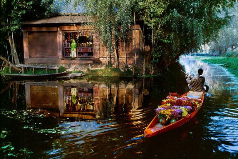 Steve McCurry (b. 1950) - Flower Vendor at Dal Lake, 1999 © Steve McCurry/Courtesy Peter Fetterman Gallery