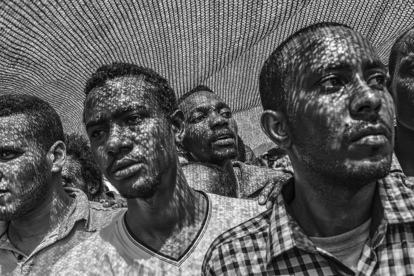 After disembarking from the MSF Bourbon Argos ship, migrants are processed for identification and registration by Italian and European authorities. Port Vibo Valentia, Italy. 28 August 2015. © Francisco Zizola