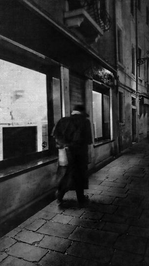 Venice at Night - Man Carrying Newspaper © Jim McKinniss