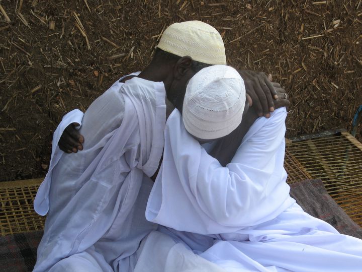 Cecilia Goin, Two brothers reunite after being separated for over 20 years, Sinnar, Sudan, 2007 © ICRC