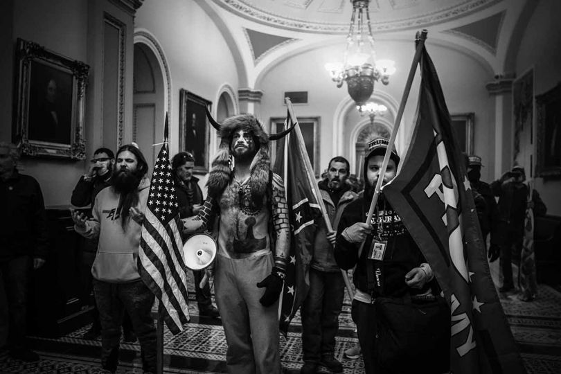 Capitol police confront the first rioters. Upon the first breach, rioters chase an officer through the halls to the entrance of the senate. Washington D.C., January 6 2021 © Mark Peterson