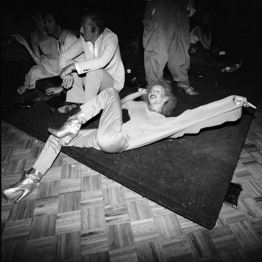 Nicole’s Silver Boots Stretched on Floor, Studio 54, NY, NY, 1977 © Meryl Meisler 