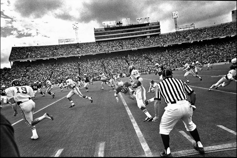 Garry WInogrand, UT Football, from Figments From The Real World, as appears in the film. Special Note: Count them -- one of the few photographs of its kind where all 22 players from both teams are visible in a single frame. Who else would shoot a football game with a wide angle lens?