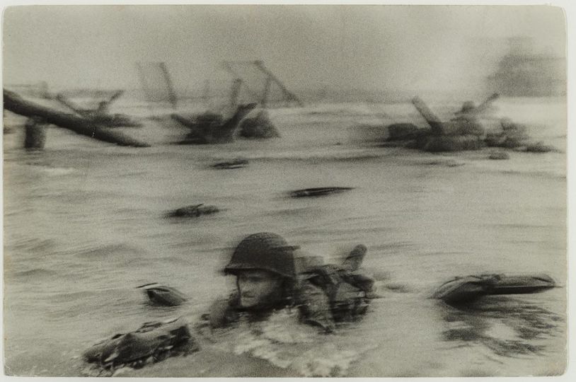 Normandy Invasion on D‑Day, Soldier Advancing through Surf, 1944 Robert Capa (American (born in Hungary), 1913–1954)
Photograph, gelatin silver print
*	The Howard Greenberg Collection—Museum purchase with funds donated by the Phillip Leonian and Edith Rosenbaum Leonian Charitable Trust
*	Robert Capa © International Center of Photography / Magnum Photos
*	Courtesy Museum of Fine Arts, Boston
