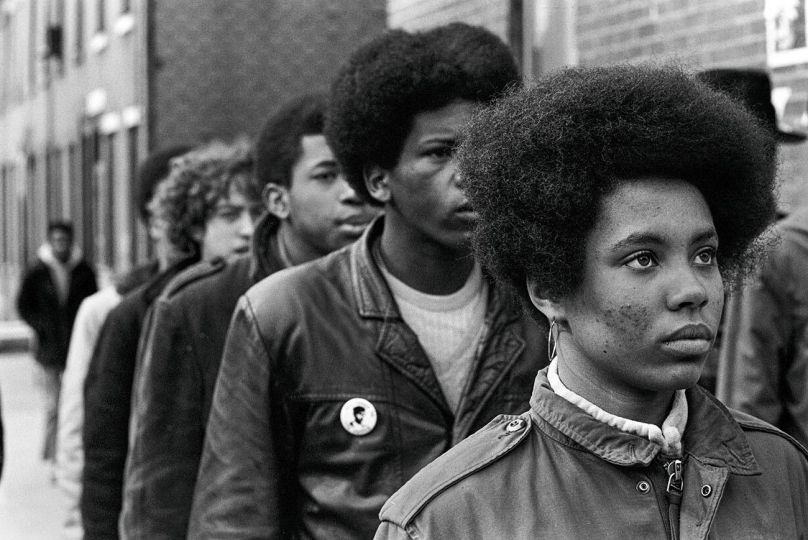 1970 - Philadelphia, Pennsylvania: The Black Panther Party was one of the most influential responses to racism and inequality in American history. The Panthers advocated armed self-defense to counter police brutality, and initiated a program of patrolling the police with guns and law books. Their enduring legacy is their programs, like Free Breakfast for Children, which helped to inspire a national movement of community organizing for economic independence, education, nutrition, and health care. Seale believed that “no kid should be running around hungry in school,” a simple credo that lead FBI director J. Edgar Hoover to call the breakfast program, “the greatest threat to efforts by authorities to neutralize the BPP and destroy what it stands for.” ©2022, Stephen Shames