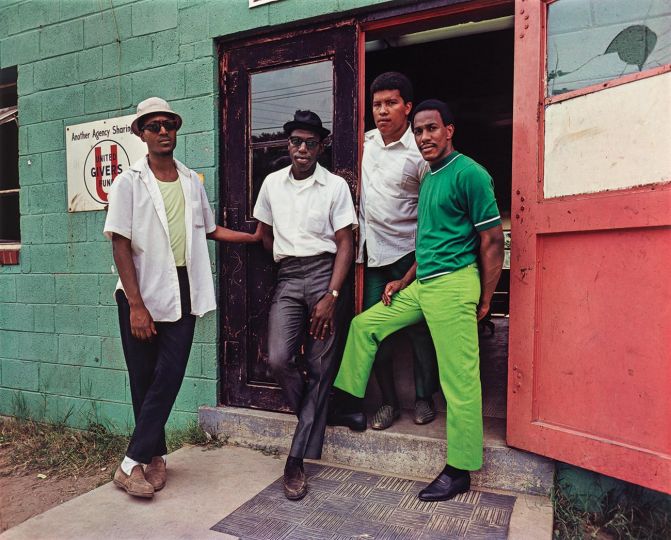 Evelyn Hofer (American, born Germany, 1922–2009), Four Young Men, Washington, DC, 1968, dye transfer print, High Museum of Art, Atlanta, purchase with funds from Joe Williams and Tede Fleming, 2021.104. © Estate of Evelyn Hofer.
