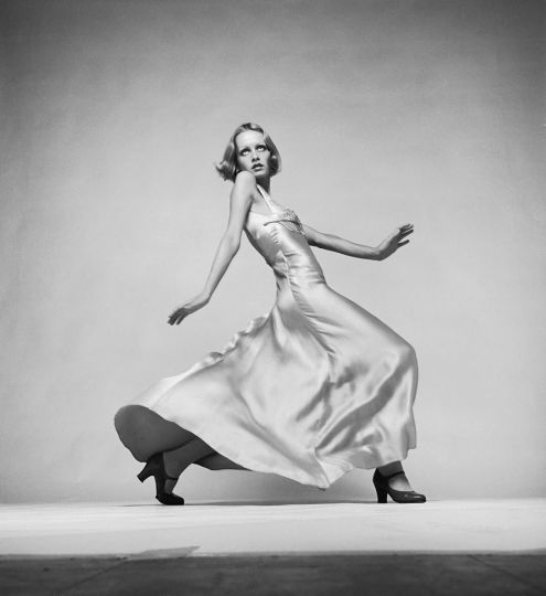 British model Twiggy wearing a fitted satin evening dress in a promotional shot for Ken Russell's 'The Boy Friend', 1970. © Justin de Villeneuve - Courtesy The Selects Gallery 