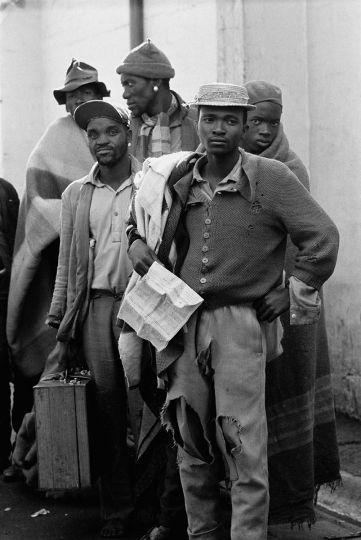 Ernest Cole - South Africa, 1960s. Pensive tribesmen, newly recruited to mine labour, await processing and assignment. From the chapter „The Mines“ © Ernest Cole / Magnum Photos